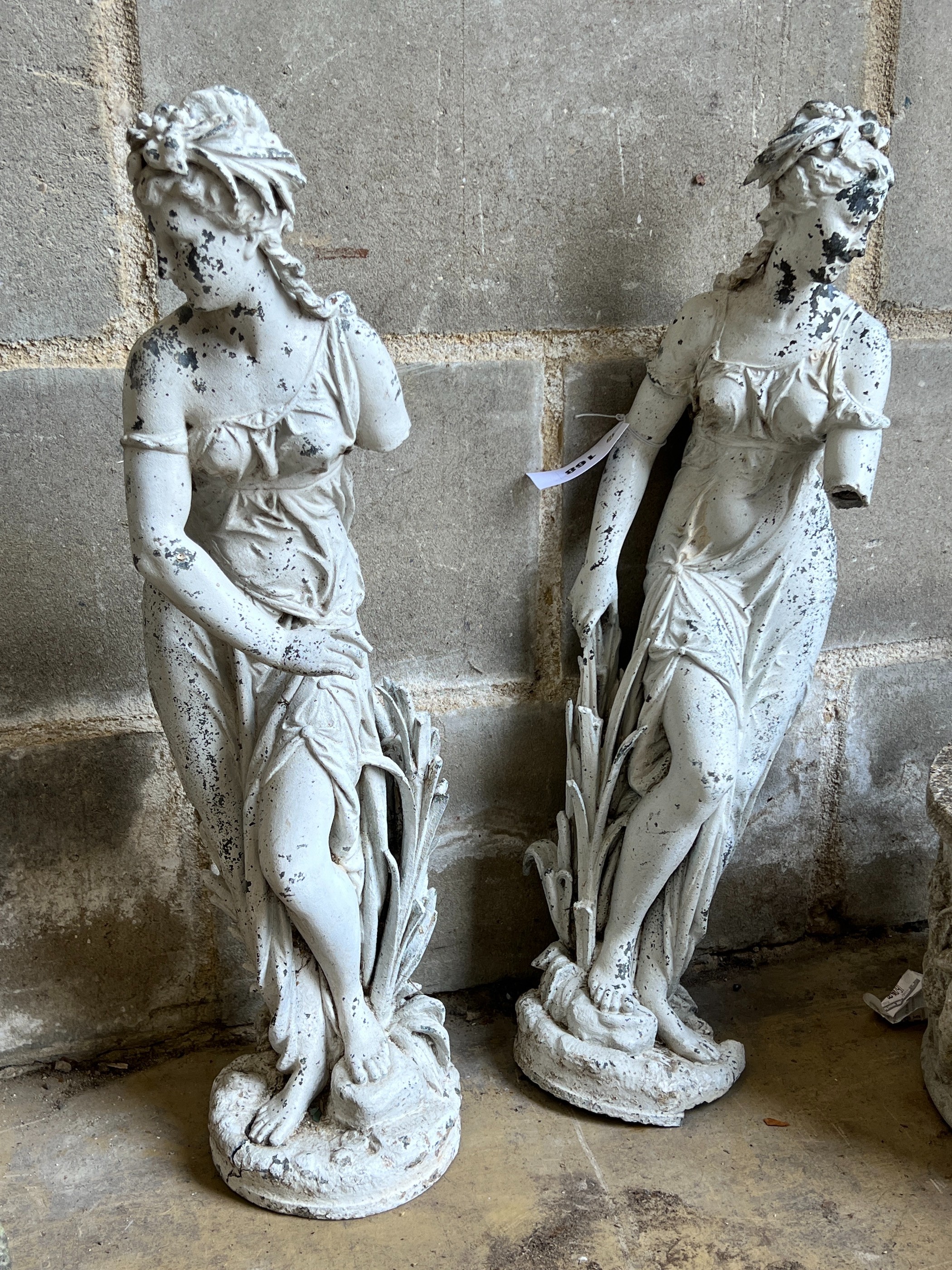 Two painted metal garden figural ornaments, larger height 61cm